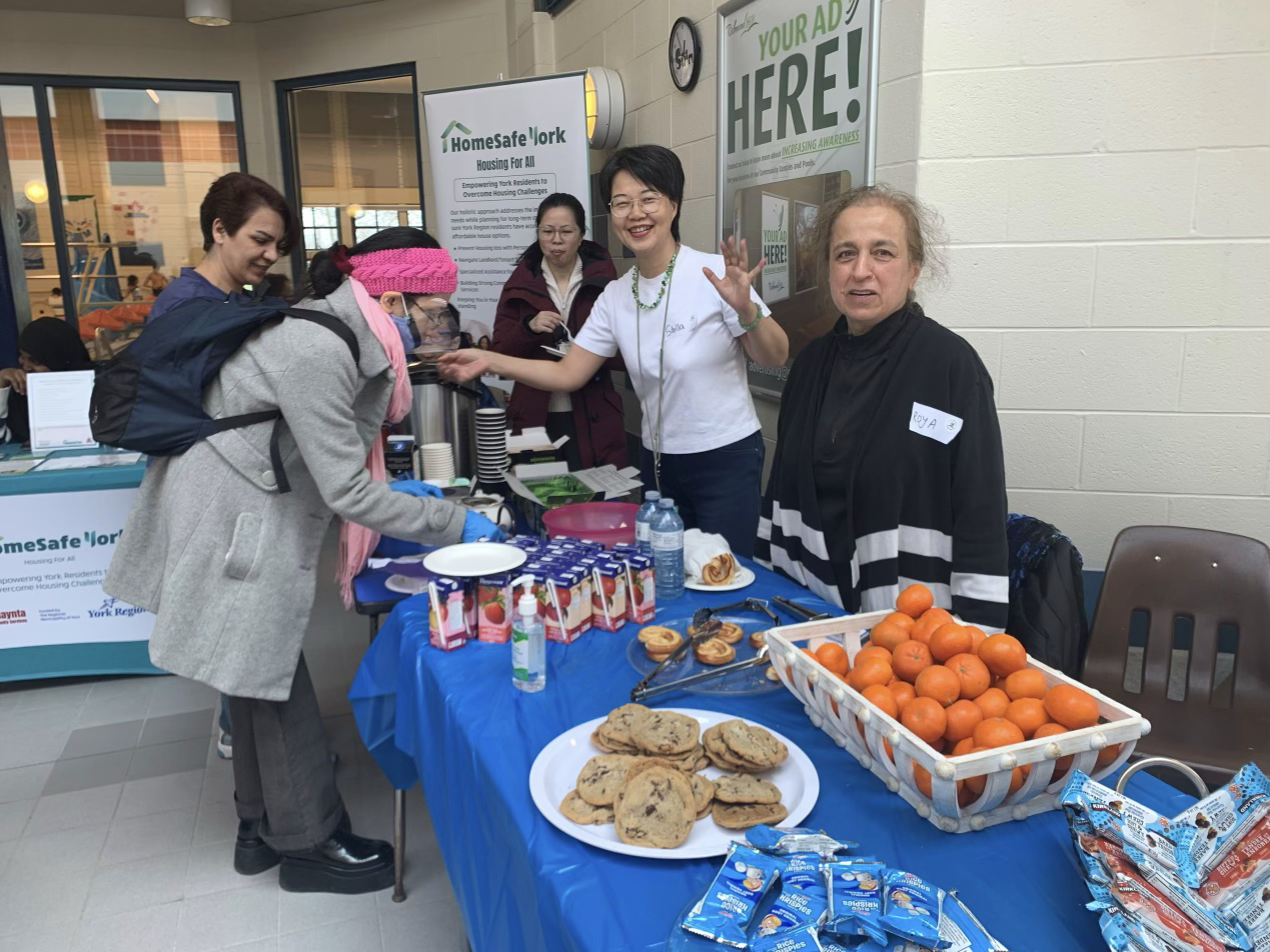Stella volunteering at community afternoon tea events